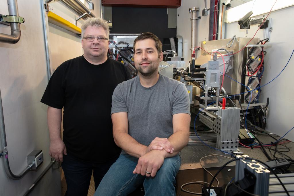 ORNL scientists Chris Tulk, left, and Jamie Molaison were part of a team that discovered a pathway to the unexpected formation of dense, crystalline phases of ice thought to exist beyond Earth’s limits. They used the unique neutron scattering capability of the Spallation Neutrons and Pressure Diffractometer at ORNL’s Spallation Neutron Source for the experiment. 