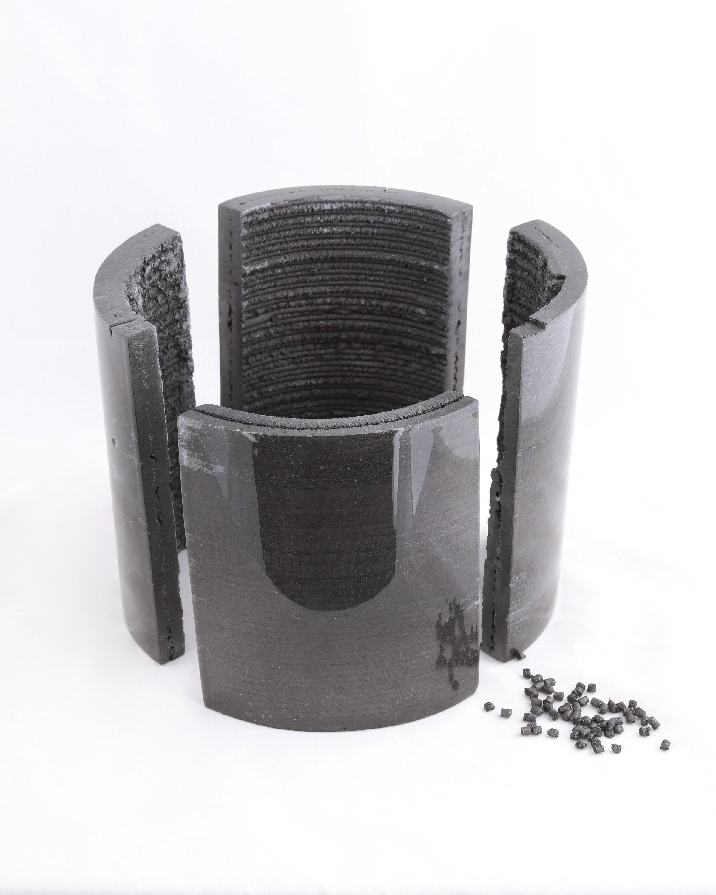 Composite pellets are melted, compounded, and extruded layer-by-layer into desired forms.