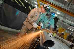 Pipe fitters David Adaline and Lloyd Robinette (left) are among hundreds of employees who helped UT-Battelle set a safety record. (ORNL photo/Curtis Boles) 