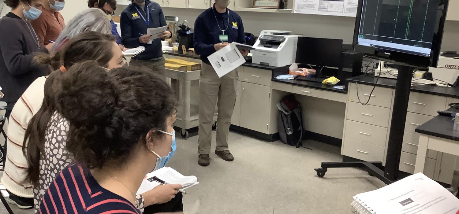 University of Michigan students review measurements during a visit to ORNL in October 2021