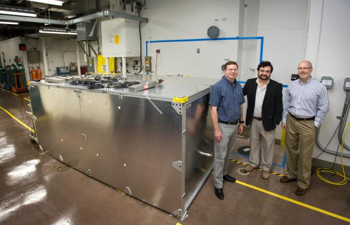 From left, David Dean, Alfredo Galindo-Uribarri and Chris Bryan of Oak Ridge National Laboratory check on a prototype detector at the High Flux Isotope Reactor, a Department of Energy Office of Science User Facility that creates continuous neutron beams. 
