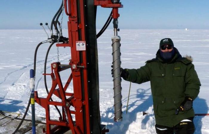 As part of the Next-Generation Ecosystem Experiments Arctic project, scientists use a hydraulic rig to extract soil samples from the frozen soil in Utqiaġvik, Alaska.