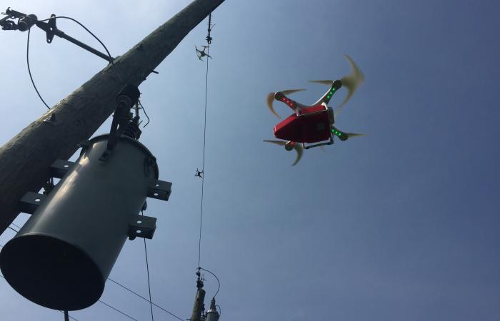 Testing the use of a drone to inspect electrical transformers. (courtesy: ORNL’s Peter Fuhr)