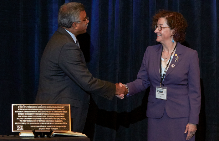 ORNL Deputy for Science and Technology Thomas Zacharia accepts a plaque from American Physical Society President-elect Laura Greene designating ORNL's Holifield Radioactive Ion Beam Facility as a Historic Physics Site.