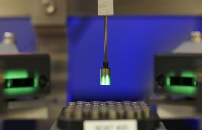A second generation of the Pu-238 pellet automated metrology system being developed in an ORNL lab. (Photo 4)