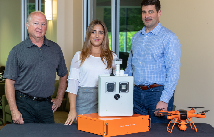 Inventors of the integrated sensor technology include Peter Fuhr, left, Marissa Morales-Rodríguez and Sterling Rooke. Credit: Carlos Jones/Oak Ridge National Laboratory, U.S. Dept. of Energy
