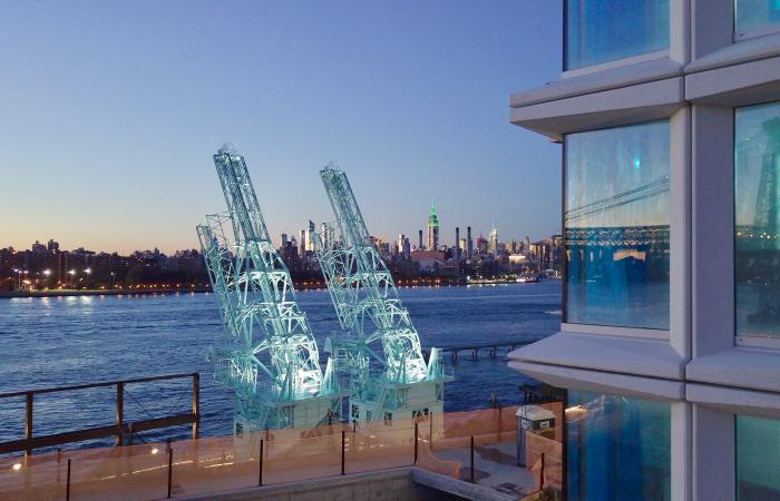 The concrete parts are installed in a residential and commercial tower (above center and below) on the site of the Domino Sugar Factory along the waterfront in Brooklyn. Windows in the tower resemble sugar crystals. Image credit: Gate Precast