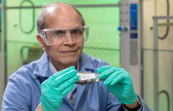 Oak Ridge National Laboratory's Ramesh Bhave co-invented a process to recover high-purity rare earth elements from scrapped magnets of computer hard drives (shown here) and other post-consumer wastes. Credit: Carlos Jones/Oak Ridge National Laboratory, U.S. Dept. of Energy