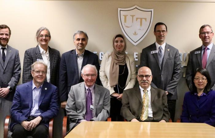 Representatives from The University of Toledo and the U.S. Department of Energy’s Oak Ridge National Laboratory (ORNL) in Tennessee are teaming up to conduct collaborative automotive materials research.” Credit: University of Toledo