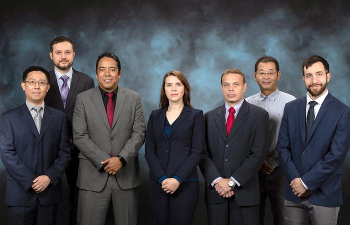 The Awards Night team award for research accomplishment went to a multidisciplinary group cited for the "pioneering use of electron microscopy to identify site-specific isotopic labels at nanoscale resolution." Team members are, from left, Jingsong Huang, Jacek Jakowski, Juan Carlos Idrobo Tapia, Santa Jansone-Popova, Ilja Popovs, Jong Keum and Jordan Hachtel.