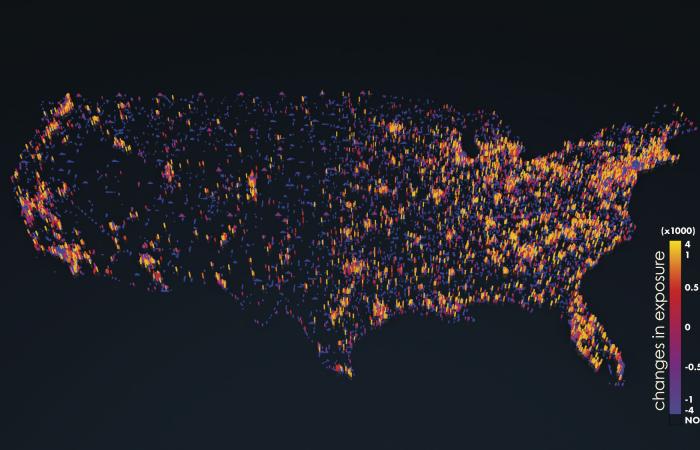 The map displays projected changes in human exposure to extreme climate events at a 1-kilometer scale from 2010 to 2050, which range from minor decreases in rural and suburban areas (blue, purple) to moderate (pink, red) and major (orange, yellow) increases in densely populated urban centers. Image credit: Adam Malin/Oak Ridge National Laboratory, U.S. Dept. of Energy