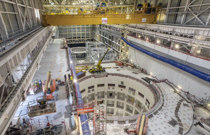The tokamak pit in the foreground is the destination for the heaviest lift of ITER assembly, the 1250 ton cryostat base. Photo: ITER Organization