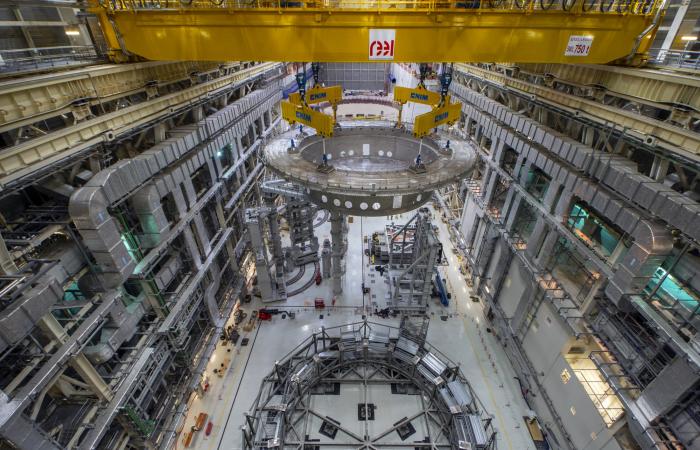 The 1250 ton cyrostat base begins its journey to the ITER tokamak pit. Credit: ITER Organization