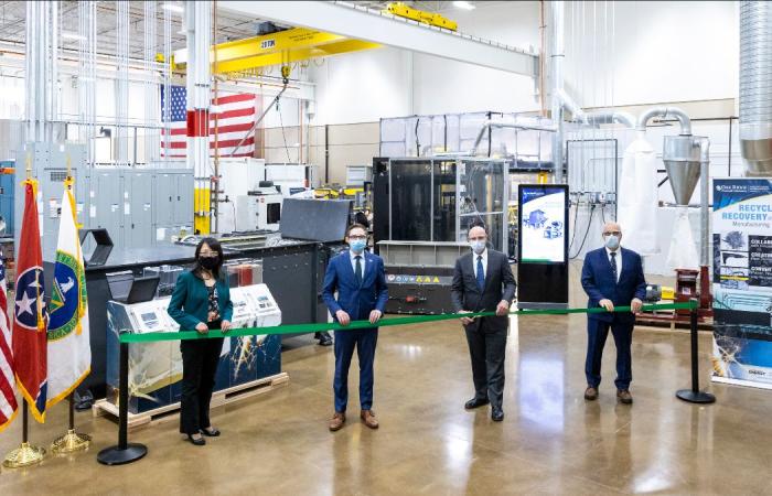 At the DOE Manufacturing Demonstration Facility at ORNL, EERE Assistant Secretary Daniel Simmons, center right, with ORNL’s Xin Sun, EERE Deputy Assistant Secretary Alex Fitzsimmons and ORNL’s Moe Khaleel, dedicated new capabilities in composites recycling. Credit: Carlos Jones/ORNL, U.S. Dept. of Energy