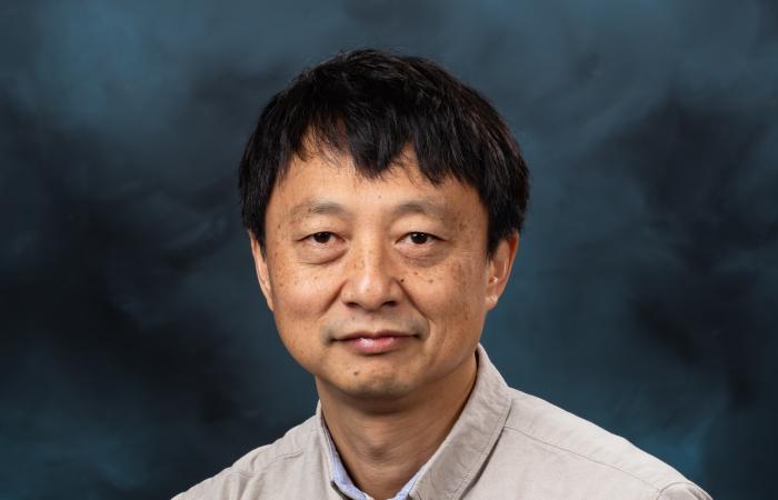 Frank Liu of ORNL leads a multi-institution project focused on improving the efficiency of complex systems with artificial intelligence. Credit: Carlos Jones/ORNL, U.S. Dept. of Energy