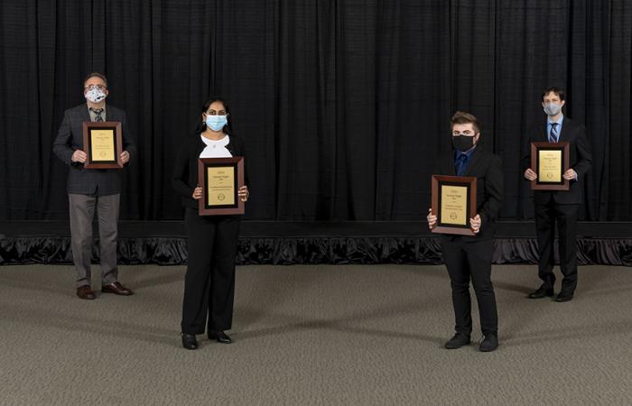 The Director’s Award for Outstanding Team Accomplishment in Science and Technology went to Mircea Podar, Manasi Balachandran, Connor Cooper, Jerry Parks and Dawn Klingeman (not pictured). Credit: Carlos Jones/ORNL, U.S. Dept. of Energy