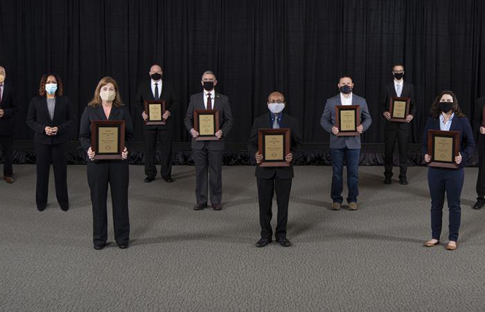 The Director's Award for a Mission Support team went to, on first row, Tina Summers, Parans Paranthaman and Emma Betters. On the second row are Merlin Theodore, Peter Lloyd, Jason Newport, and Tony Reynolds. On the third row are Peter Tsai, Kim Sitzlar and Gregory Larsen. Not pictured: Jesse Heineman. Credit: Carlos Jones/ORNL, U.S. Dept. of Energy