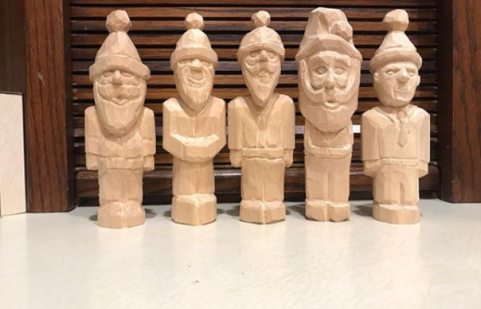 Santas carved by Jim Miller last Christmas.