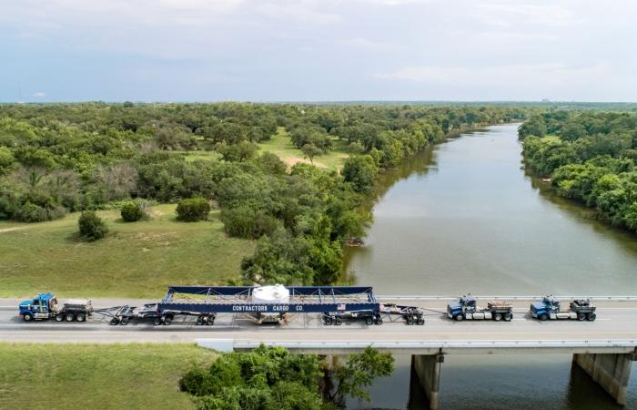 ORNL staff contributed to the successful transport of ITER’s first central solenoid module, which crossed the Brazos River in Texas on a specially equipped girder trailer as it neared the port of Houston en route to France. Credit: Yesenia Rodriguez/US Ocean