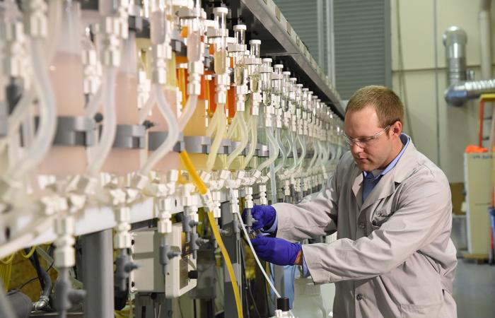 Kevin Lyon, an INL chemical engineer with expertise in applied solvent extraction, operates a counter-current solvent extraction system for testing and developing the process design for the separation technology. Credit: INL, U.S. Dept. of Energy