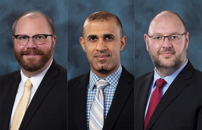 The Director's Award for Outstanding Team Accomplishment in Science and Technology went to Nicholas Peters, left, and his team in quantum communications and networking, including Muneer Alshowkan, center, and Phil Evans. Credit: ORNL, U.S. Dept. of Energy