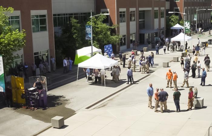 ORNL employees gather on the campus quad for the Facilities and Operations Charity Carnival for Kids and Barbecue Cookoff to benefit East Tennessee Children’s Hospital and St. Jude’s Children’s Research Hospital on June 23, 2021. Credit: Carlos Jones/ORNL, U.S. Dept. of Energy