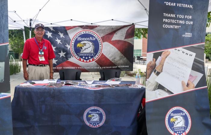 Joe Sutton with HonorAir stands ready to answer questions at the organization's booth at the Fish, Fetch and Fly Festival on the ORNL quad on June 30, 2021. Credit: Genevieve Martin/ORNL, U.S. Dept. of Energy