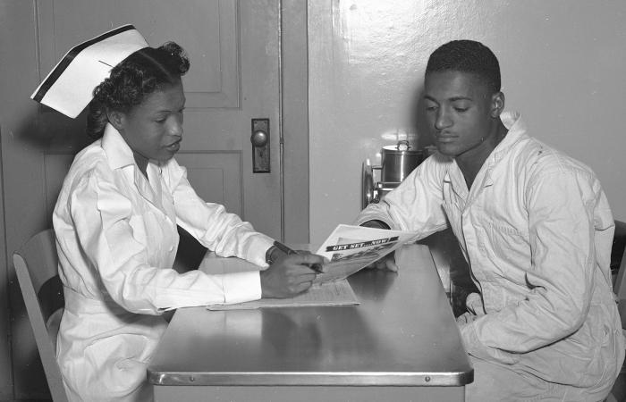 President Harry Truman selects ORNL nurse Doris Scott to serve on the Industrial Health Section of the President’s Commission for Health. The committee’s purpose is to inventory and study national health needs and related education. Credit: ORNL