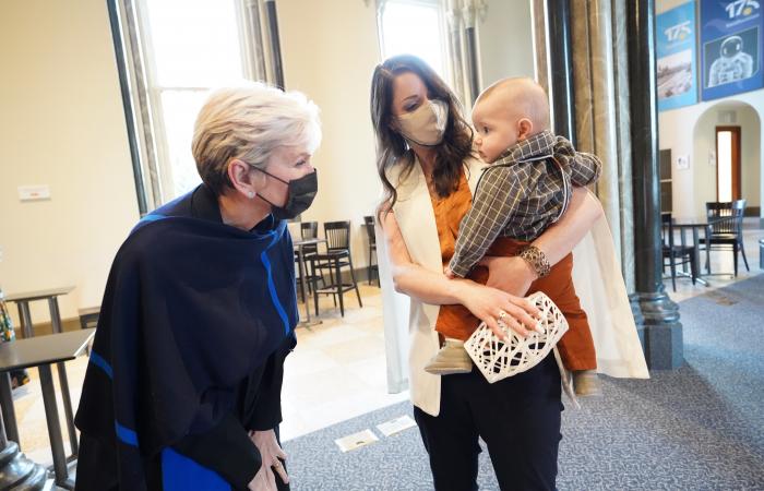 Department of Energy Secretary Jennifer Granholm, left, meets John Luke, son of ORNL advanced manufacturing researcher Amy Elliott, during the IfThenSheCan event at the Smithsonian exhibit. Elliott was honored for her excellence in STEM during Women in History month. Credit: DOE