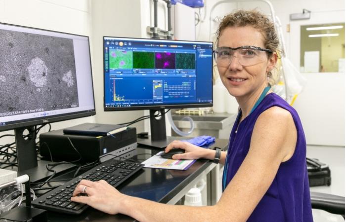 Elizabeth Herndon uses spectroscopic techniques at ORNL to analyze the chemical composition of leaves and other environmental samples to better understand the soil carbon cycle. Credit: Genevieve Martin/ORNL, U.S. Dept. of Energy