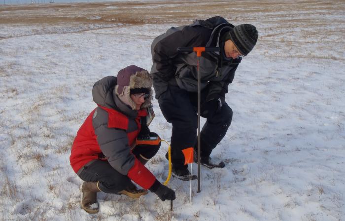 Susan Hubbard, left, deputy for science and technology at ORNL and a former team member of NGEE Arctic, with Stan Wullschleger at a field site in northern Alaska. Credit: ORNL, U.S. Dept. of Energy.