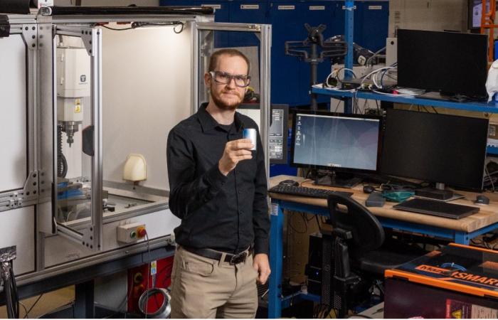 Logan Sturm, Alvin M. Weinberg Fellow at ORNL, creates a mashup between additive manufacturing and cybersecurity research. Credit: Carlos Jones/ORNL, U.S. Dept. of Energy 
