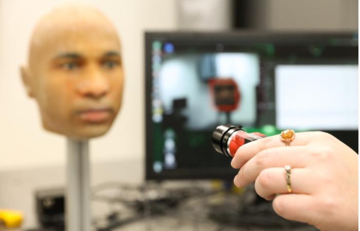 ORNL’s Nell Barber uses a mannequin to test a facial recognition camera. Credit: Genevieve Martin/ORNL, U.S. Dept. of Energy