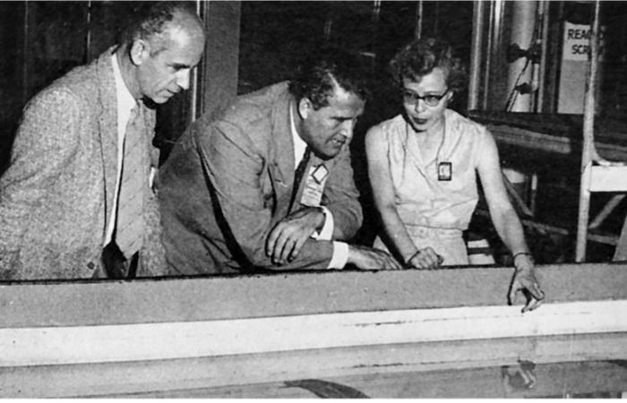 From left, rocket scientists Ernst Stuhlinger and Wernher von Braun got a tour of ORNL’s swimming pool reactor in 1957 from Libby Johnson, Bulk Shielding Reactor supervisor. Credit: ORNL, U.S. Dept. of Energy
