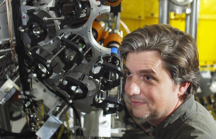 Oak Ridge National Laboratory’s Mitch Allmond works with the Facility for Rare Isotope Beams Decay Station initiator, which combined diverse detectors for FRIB’s first experiment. Credit: Robert Grzywacz/ORNL, U.S. Dept. of Energy