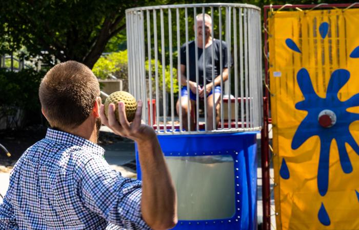 Scott Branham, chief financial officer of ORNL, manned the dunking booth for the Facilities and Operations Directorate’s ORNL Gives campaign. All ORNL directorates sponsored fundraisers in 2022. Credit: Carlos Jones/ORNL, U.S. Dept. of Energy