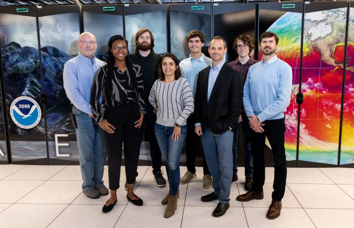 The ORNL team who installed and tested the newest Gaea system included, from left to right, Benny Sparks, Tori Robinson, Chris Coffman, Verónica Melesse Vergara, Nick Hagerty, Paul Peltz, A.J. Ruckman and Chris Fuson. Credit: Genevieve Martin/ORNL