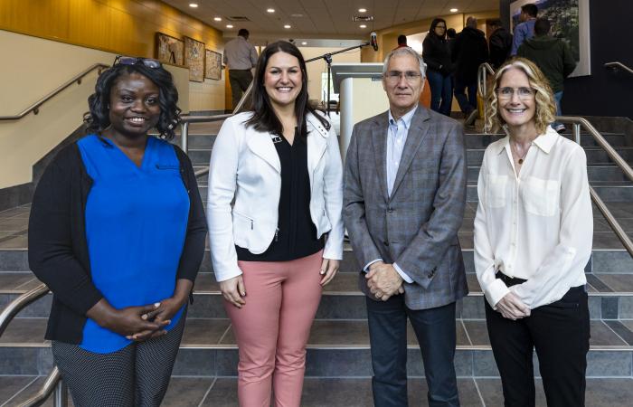 ORNL’s 80th Anniversary celebration in April also kicked off the lab’s employee charitable giving campaign, ORNL Gives. From left are ORNL’s Syreeta Vaughn, ORNL Gives co-chair; Naomi Asher, executive director for United Way of Anderson County; Interim Director Jeff Smith; and ORNL’s Kate Evans, ORNL Gives chair. Credit: Carlos Jones/ORNL, U.S. Dept. of Energy