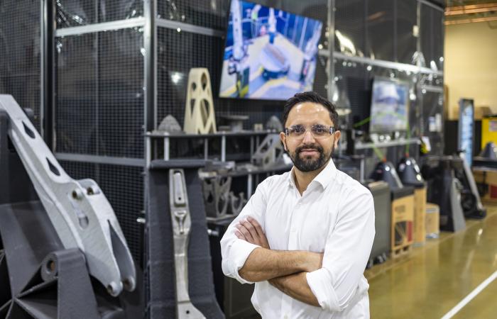 As part of his science mission, Mirko Musa is exploring how advanced manufacturing can support new technologies for efficient, clean hydropower with researchers at the Manufacturing Demonstration Facility at ORNL. Credit: Carlos Jones/ORNL, U.S. Dept. of Energy