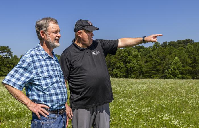 Steve Nolan, left, who manages many ORNL facilities for United Cleanup Oak Ridge, and Carl Dukes worked closely together to accommodate bringing members of the public into the Oak Ridge Reservation to collect distant images from overhead for the BRIAR biometric recognition project. Credit: Carlos Jones/ORNL, U.S. Dept. of Energy