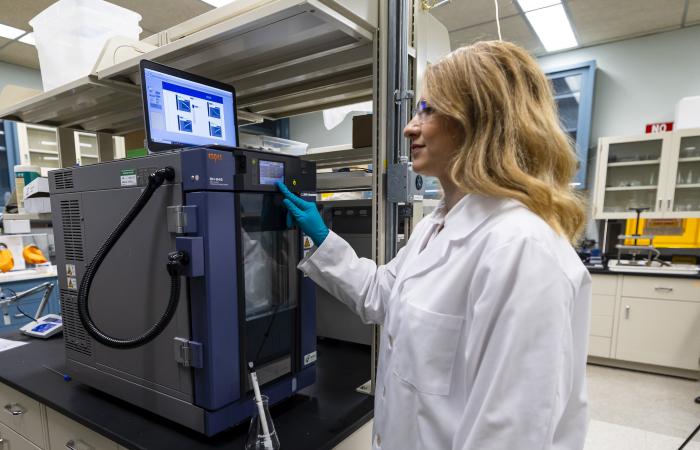 As a scientist at Oak Ridge National Laboratory, Tugba Turnaoglu is investigating new thermal energy storage materials and ways to incorporate them into cost-effective and energy-efficient heat pump designs. Credit: Carlos Jones/ORNL, U.S. Dept of Energy