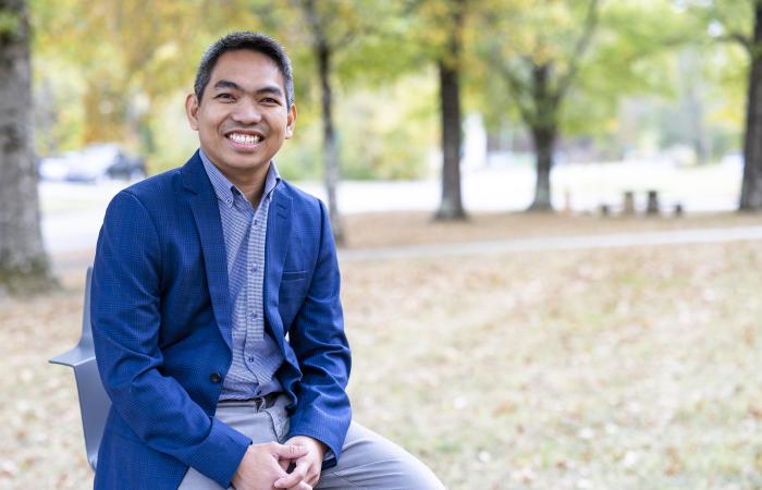 Christian Salvador is studying natural and manmade aerosols at Oak Ridge National Laboratory to improve our understanding of how atmospheric pollutants affect ecosystems and the Earth’s climate. Credit: Carlos Jones/ORNL, U.S. Dept. of Energy