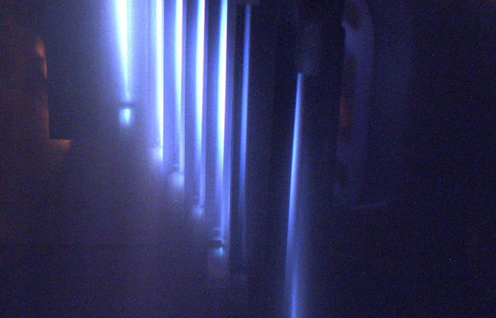 The electromagnetic isotope separator system operates by vaporizing an element such as ruthenium into the gas phase, converting the molecules into an ion beam, and then channeling the beam through magnets to separate out the different isotopes. 