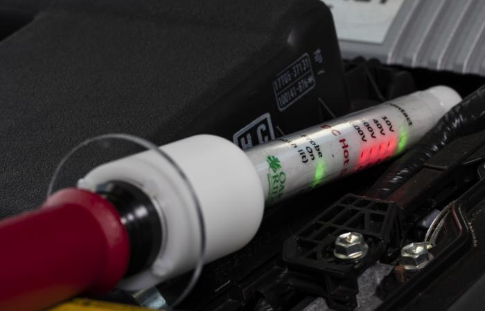 The Hot Stick voltage probe inside a hybrid EV (ORNL photographer Carlos Jones).