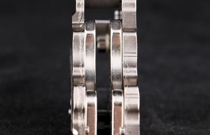 Rare earth magnets inside permalloy brackets (pictured) can be recycled with an ORNL-developed process licensed by Momentum Technologies. 