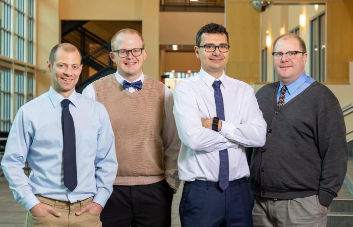 Brian Williams, Joseph Lukens, Pavel Lougovski, and Nicholas Peters (from left), research scientists with ORNL’s Quantum Information Science Group, have demonstrated two simultaneous operations on two qubits