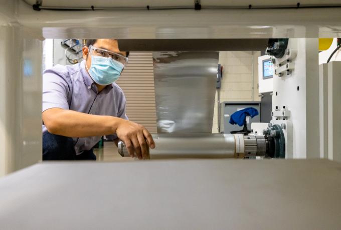 Researcher Zhijia Du operates equipment in the Grid Research Integration and Deployment Center at ORNL's Battery Manufacturing Facility. Credit: Carlos Jones/ORNL, U.S. Dept. of Energy