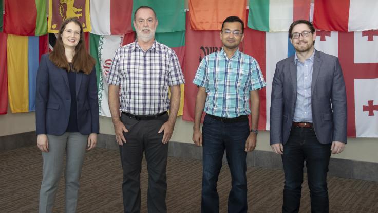 ORNL staff members (from left) Ashley Shields, Michael Galloway, Ketan Maheshwari and Andrew Miskowiec are collaborating on a project focused on predicting and analyzing crystal structures of new uranium oxide phases. Credit: Jason Richards/ORNL