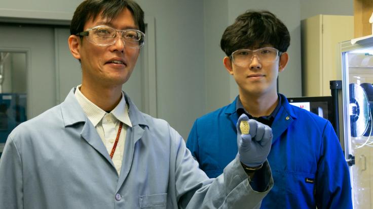 ORNL polymer scientists Tomonori Saito (left) and Sungjin Kim upcycled waste plastic to create a stronger, tougher, solvent-resistant material for new additive manufacturing applications. Credit: Genevieve Martin/ORNL, U.S. Dept. of Energy