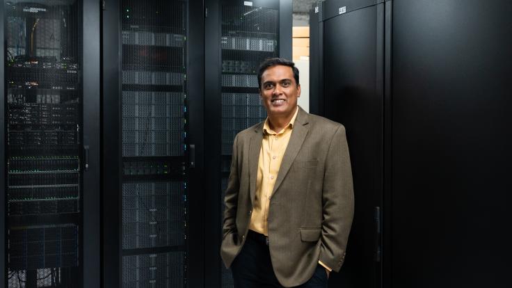 Giri Prakash, director of the ARM Data Center, works with the latest ARM computing cluster at ORNL. Credit: Carlos Jones/ORNL, U.S. Dept. of Energy